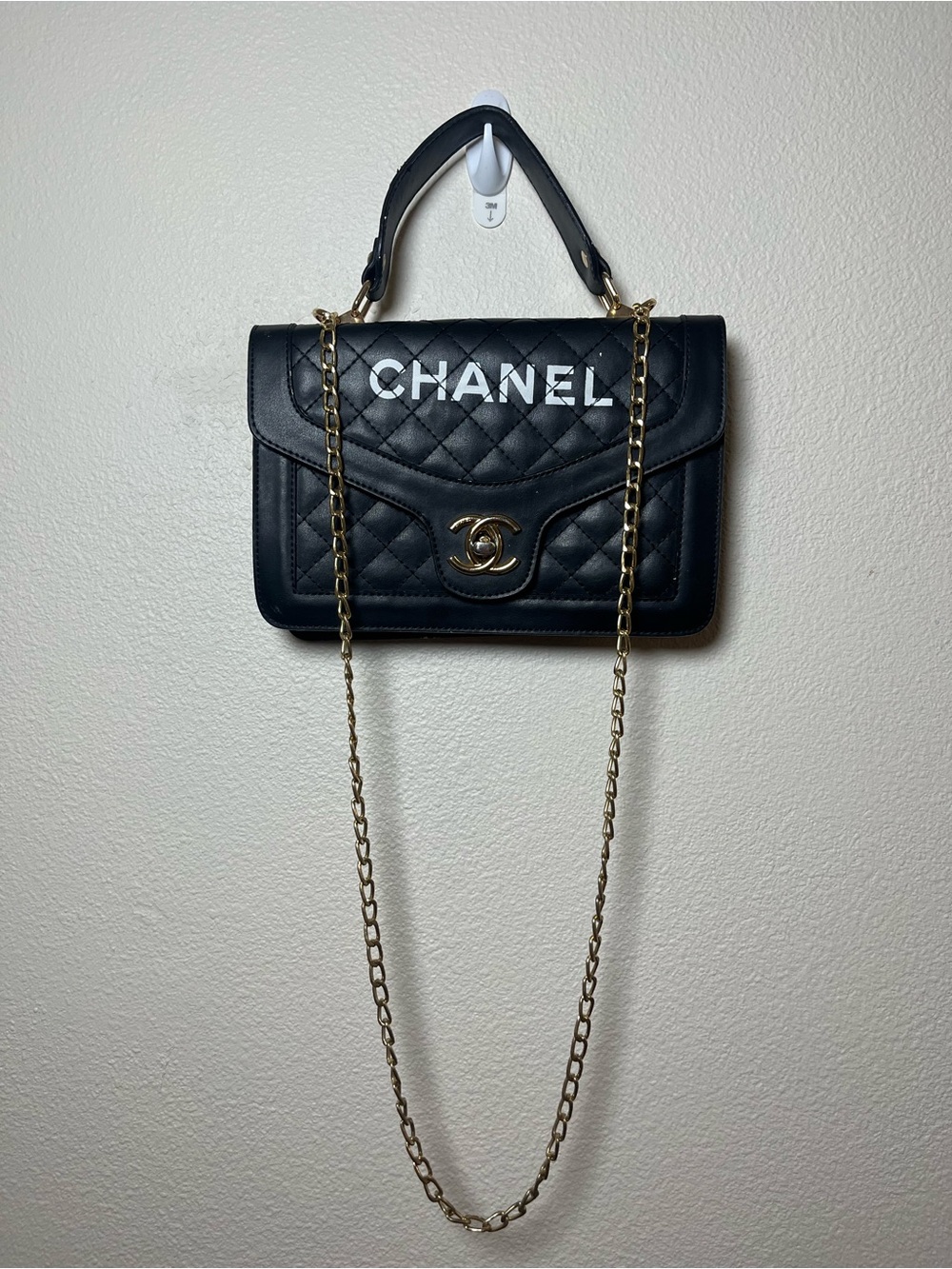 Black Quilted Crossbody Bag with Gold Hardware